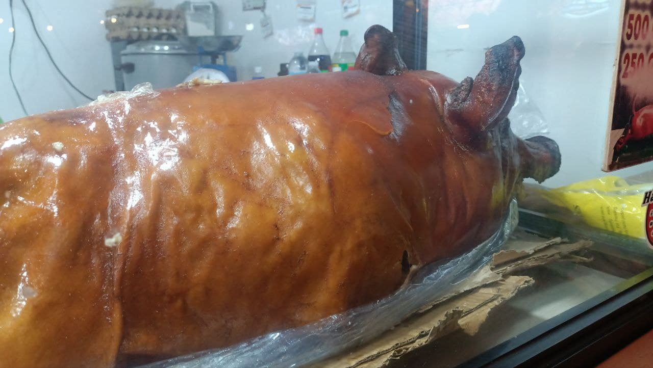 Whole lechon on display, the centrepiece of Filipino celebration food