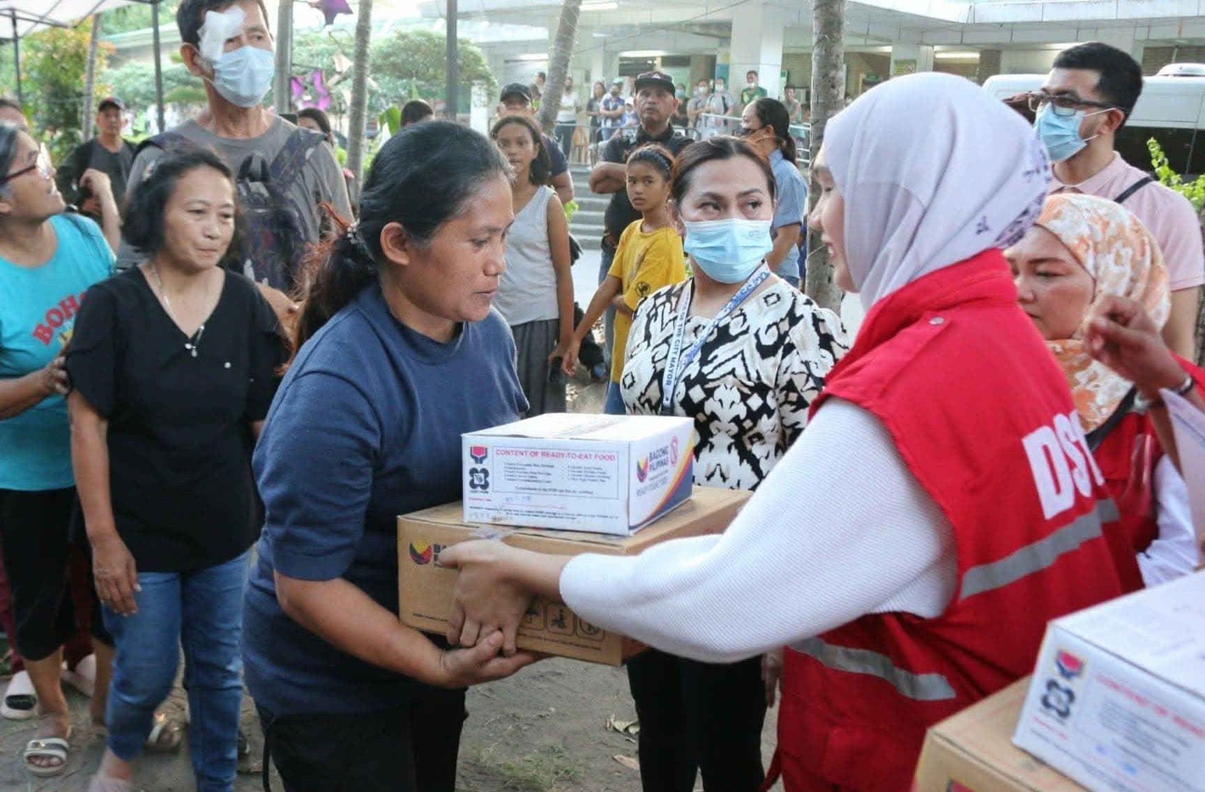DSWD relief goods being distributed to evacuees after the June 2026 Mindanao earthquake